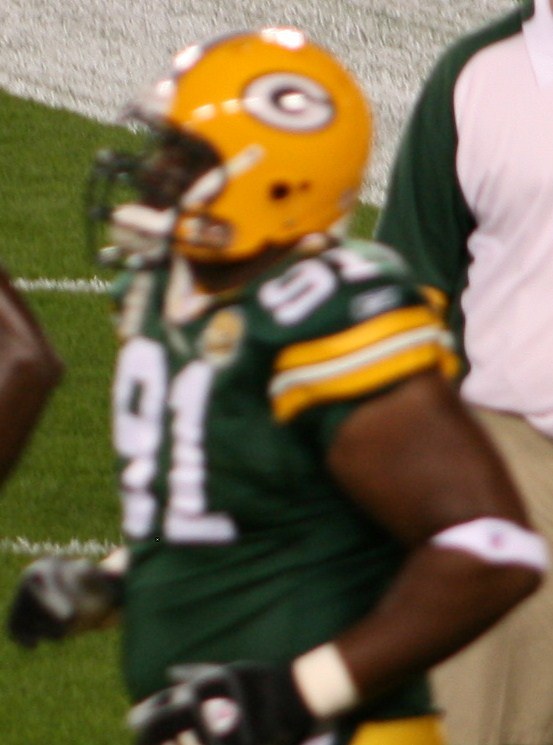 Green Bay defensive lineman Justin Harrell during the 2007 Bears–Packers game at Lambeau Field. Archival photograph; he is not a current participant.
