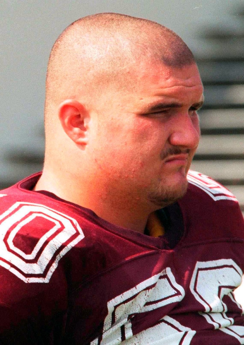 Mike Miano with Southwest Missouri State in 1996. Historical team photograph; he is not a current participant.
