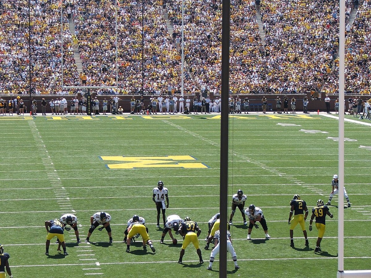 App State and Michigan at the line of scrimmage in September 2007. Historical team-action photograph; players shown are not current participants.