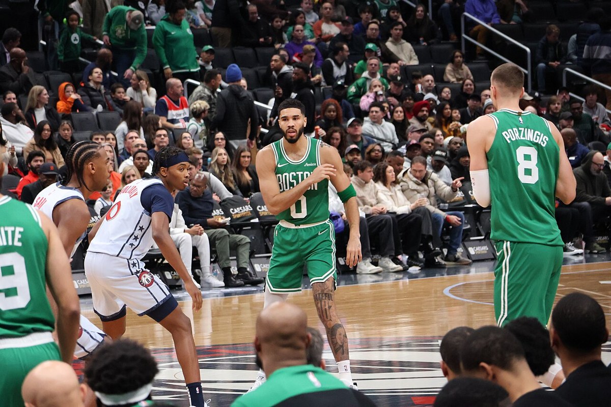 Jayson Tatum and Boston teammates against Washington in December 2024. Archival team-action photograph, not the current lineup or today’s game.