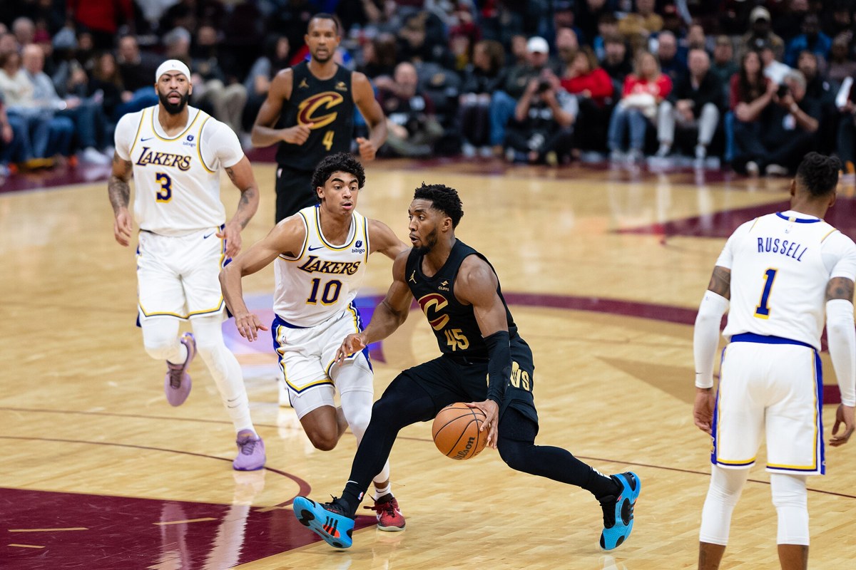 Donovan Mitchell handling the ball for Cleveland in November 2023. Archival action photograph, not Thursday&rsquo;s game.