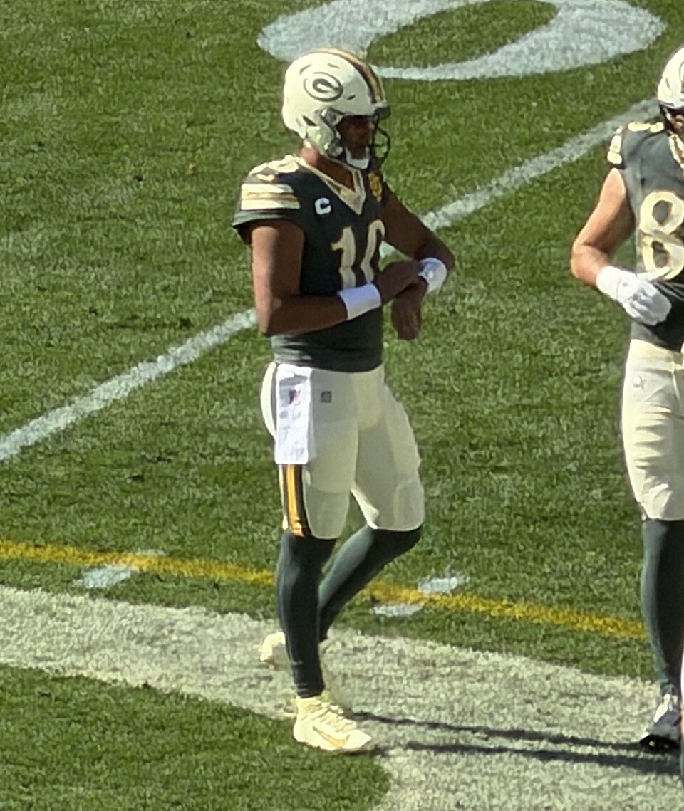 Jordan Love with Green Bay against Chicago on October 11, 2026. Earlier-game photograph, not tonight’s Carolina matchup.