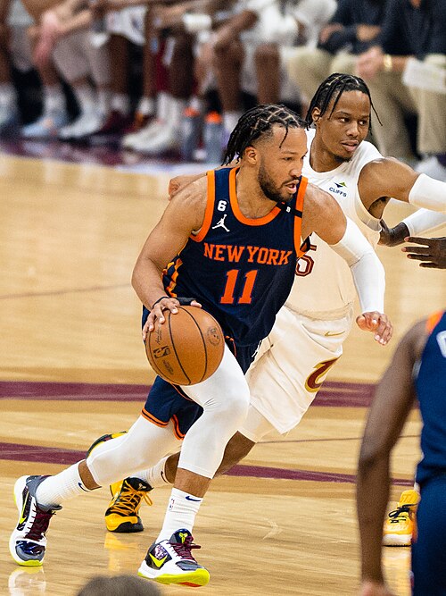 Jalen Brunson driving for New York at Cleveland in April 2023. Archival action photograph, not tonight’s Philadelphia game.